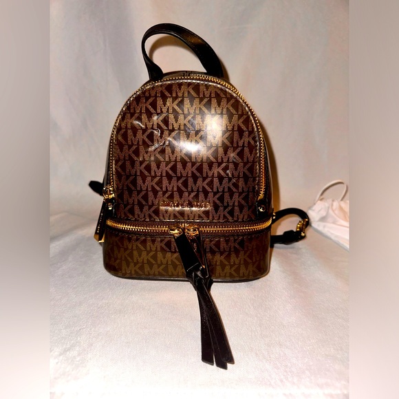 Michael Kors Handbags - Michael Kors Rhea Mini Backpack
